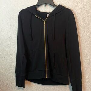 Black zip up with gold zip track